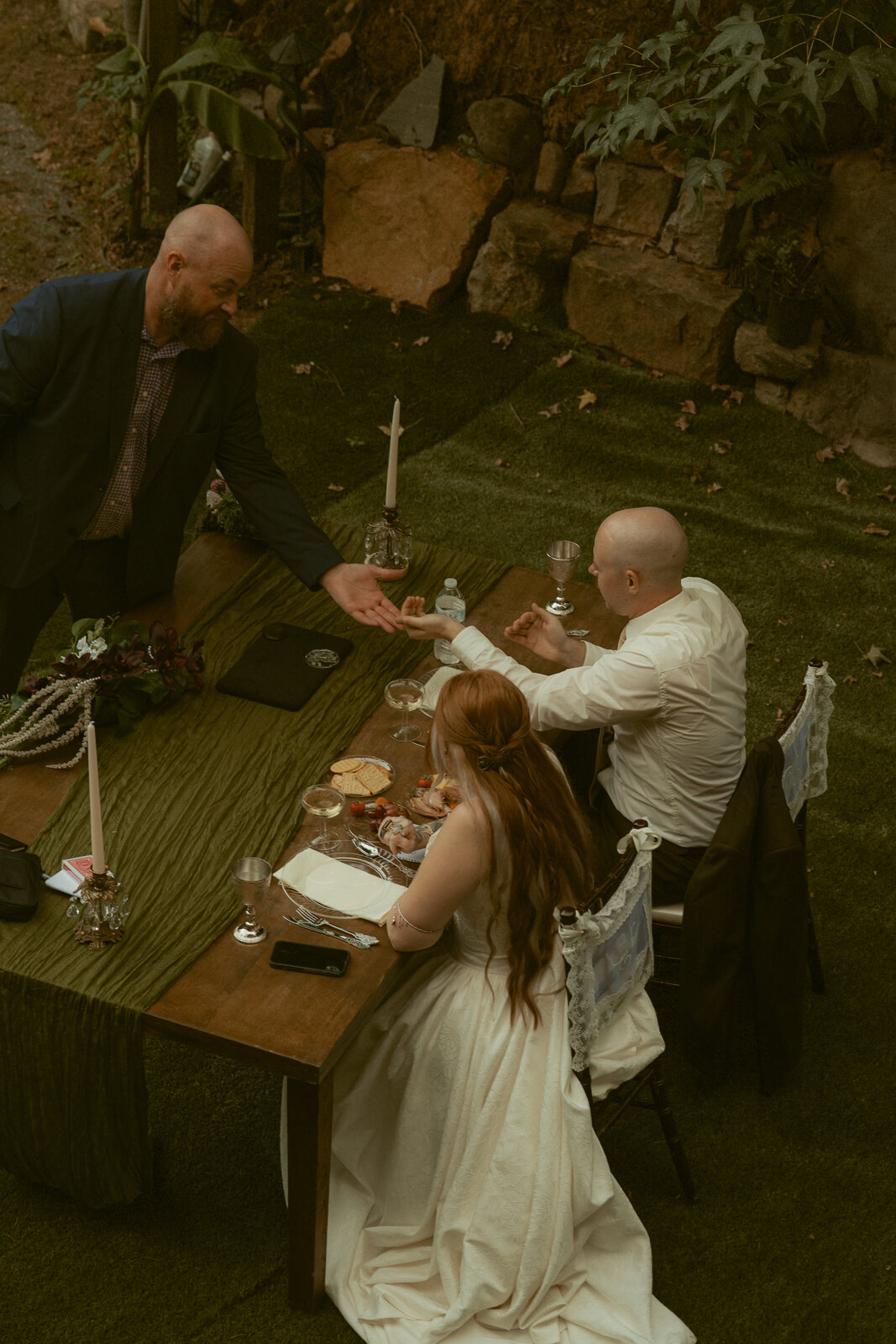 Adam Ryan performing close-up magic at Lahayla's wedding